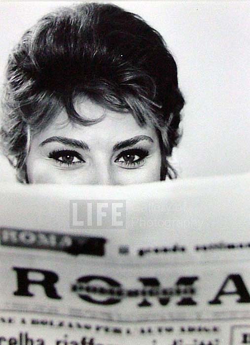 Alfred Eisenstaedt, Actress Sophia Loren Peering Over the Top of a ROMA Newspaper, Rome, Italy, 1961
Vintage Silver Gelatin Print, 11 x 8 inches