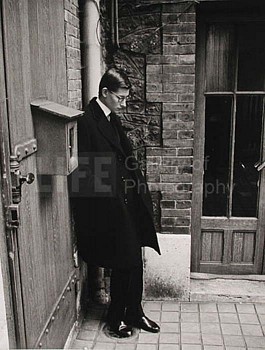 Loomis Dean - Loomis Dean Yves St. Laurent after Attending Christian Dior's Funeral