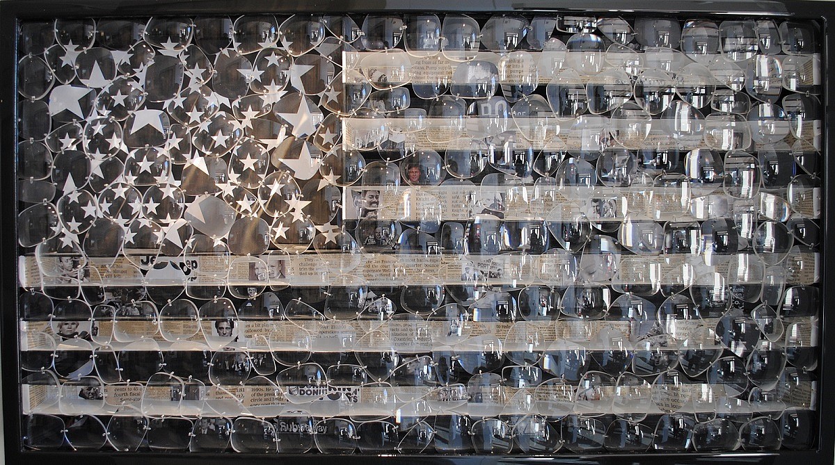 David Datuna, Viewpoint of Millions: Black and White Banner, 2013
Mixed Media Wall Sculpture, 22 x 39 x 5 inches