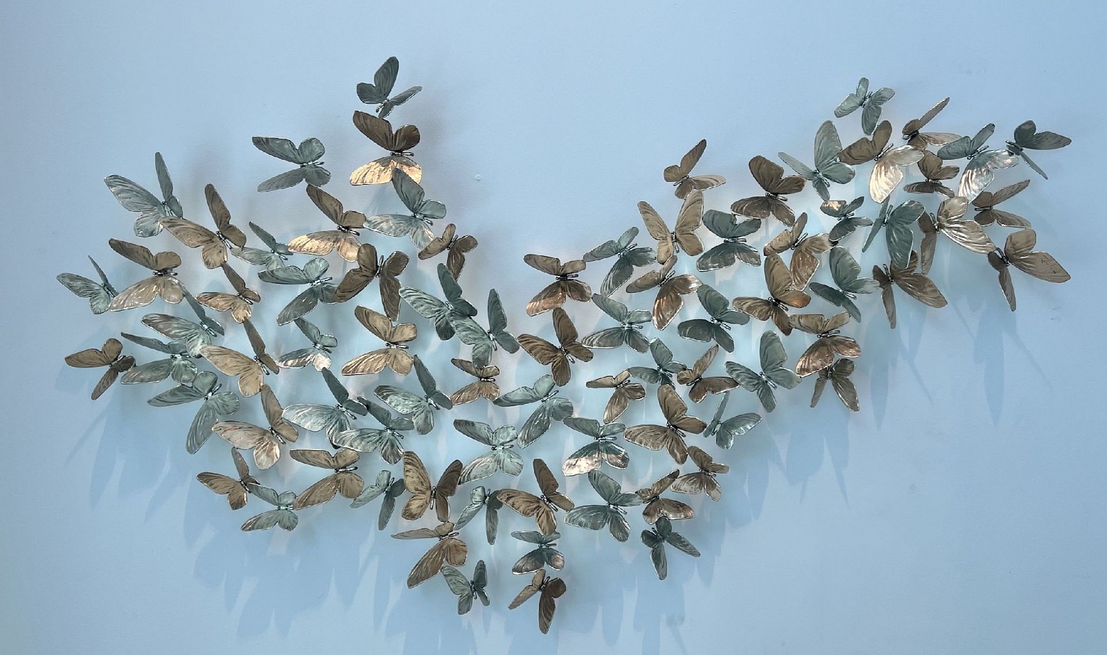 Roman Feral, Butterfly Flutter, 2023
White & Yellow Bronze Wall Sculpture, Mirror Polished, Signed, 26 3/8 x 63 in.